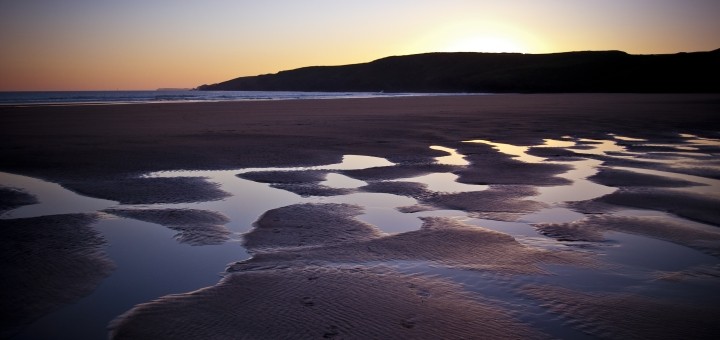 Pembrokeshire beach at dusk. Photograph by J K