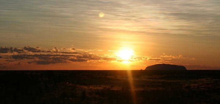 Sunrise at Uluru. Photograph by Annetteos